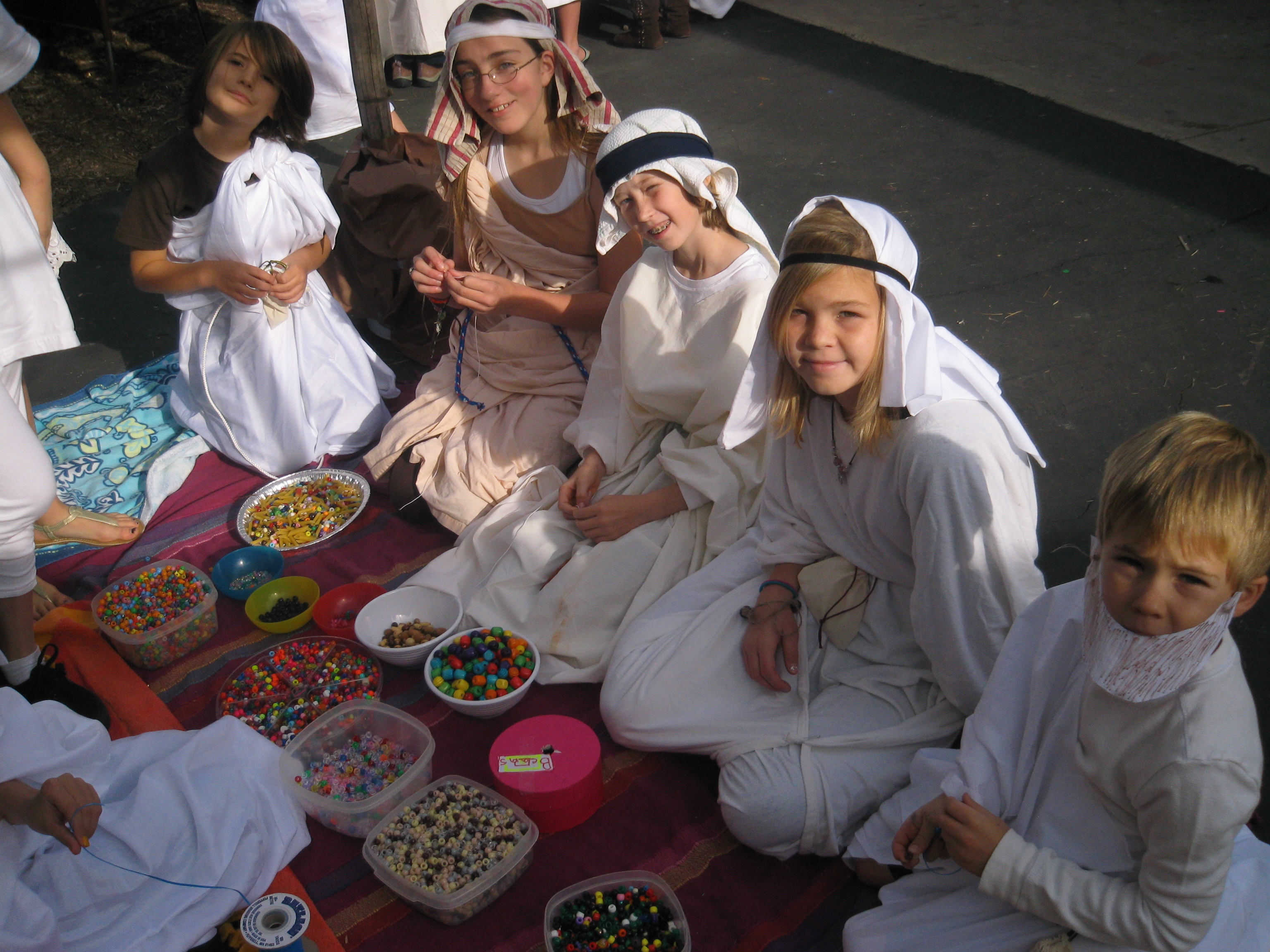 students dressed as Sumerians at the Sumerian trade fair 